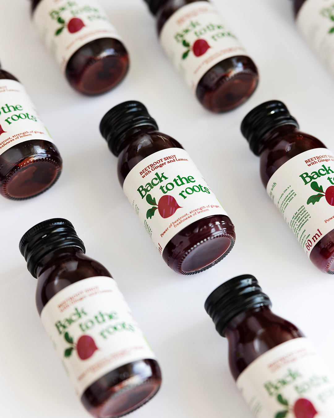 Back2TheRoots beetroot shot bottles laid flat